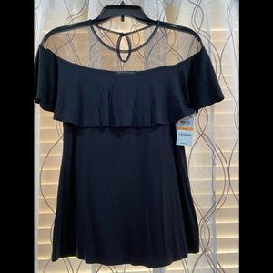 Black top with see through fabric on upper part.